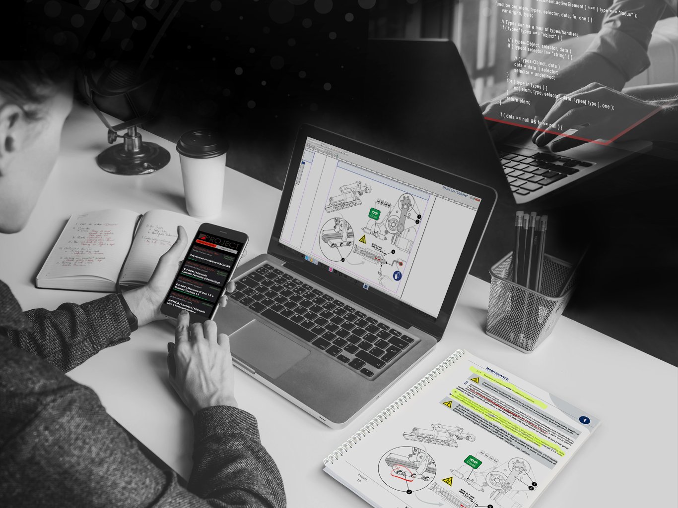 Postazione con laptop, app mobile 2.0 PROJECT e documentazione stampata a dimostrazione dell'integrazione dati.